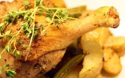 Rustic Roasted Duck Legs with New Potatoes, Sugar Snaps, and Spring Onions