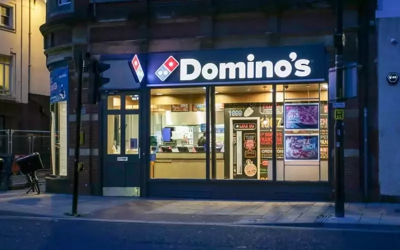 Domino's Faces Financial Headwinds Amidst Consumer Spending Shift