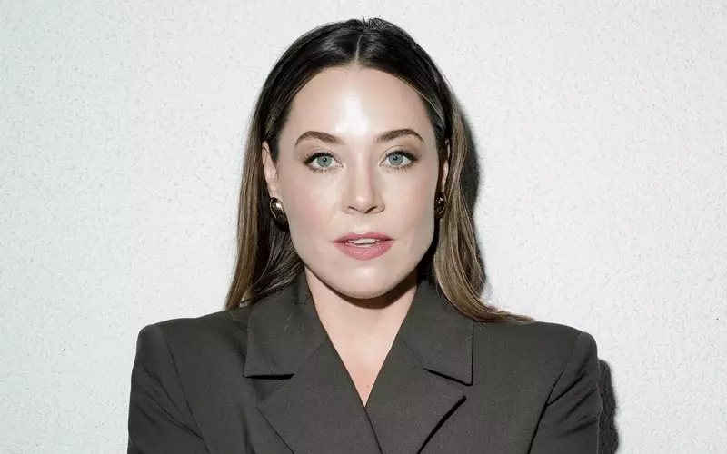 Erika Henningsen Navigates Ginny's Evolving Motherhood and Complex Relationships in 'The Four Seasons' Season 2
