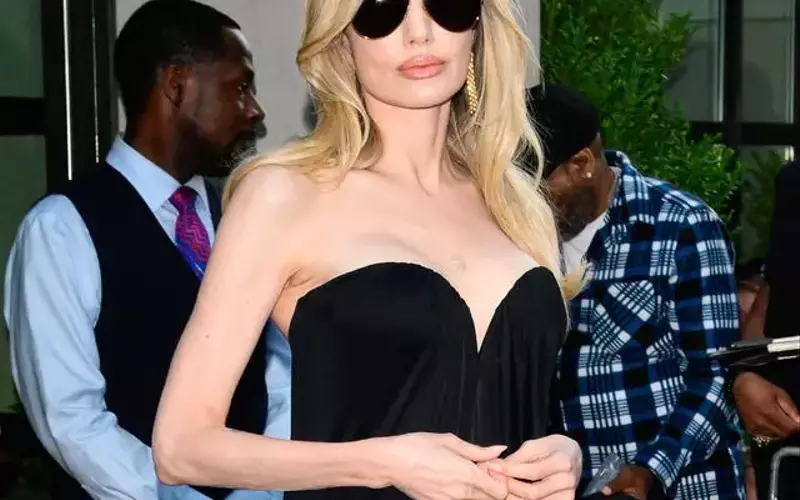 Angelina Jolie Shines in Black Gown at 'Couture' Screening