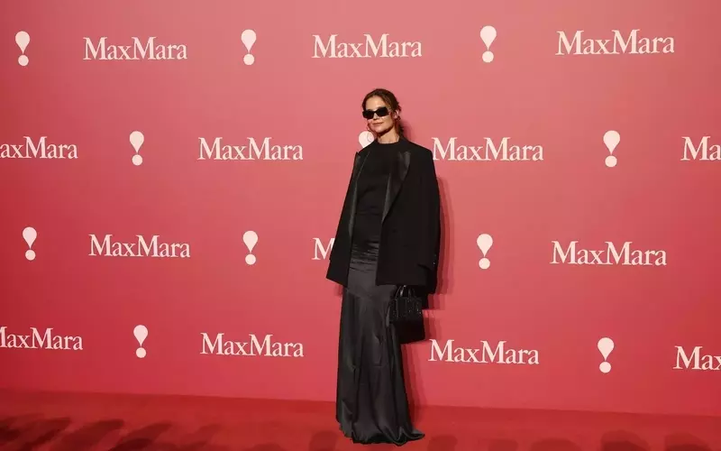 Katie Holmes Embraces 'Summer Goth' Look at Max Mara Show