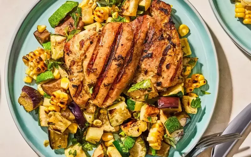 Flavorful Herb-Marinated Chicken Thighs with Grilled Vegetable Medley