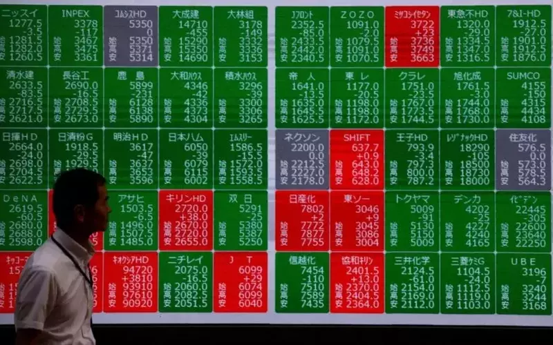 Global Markets Stumble as Fed's Inflation Stance and Oil Price Drops Reshape Investor Outlook
