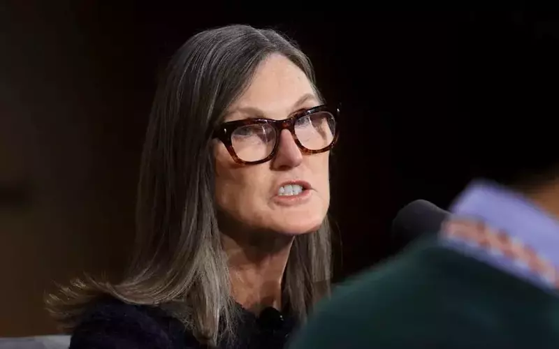Cathie Wood Boosts Coinbase Investment Amidst Tech Stock Volatility